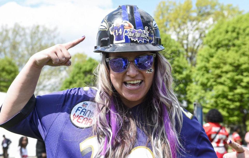 Katie Overly from Lancaster, Pennsylvania was decked out in Baltimore Ravens gear at the NFL Draft Experience Thursday, April 27, 2023, at the National WWI Museum and Memorial in Kansas City.