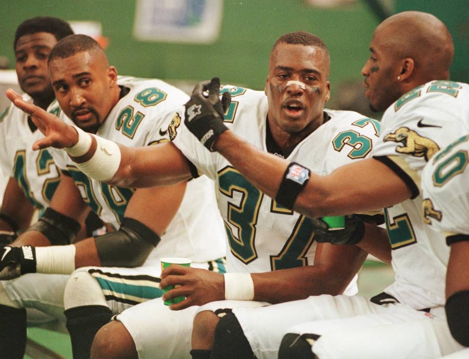 Jaguars safety Chris Hudson (center, 37) will hold a special place in team lore for his return of a blocked field goal attempt by the Pittsburgh Steelers for a touchdown on the final play of the Jags' first-ever Monday night football game on Sept. 22, 1997.