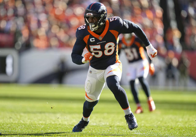 A dog wears the jersey of Denver Broncos outside linebacker Von Miller  before an NFL football game against the Tennessee Titans Sunday, Oct. 13,  2019, in Denver. (AP Photo/David Zalubowski Stock Photo 