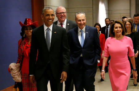 U.S. President Barack Obama arrives with Rep. Frederica Wilson (D-FL), New York Rep. Joe Crowley (D-NY), Senate Democratic Leader Chuck Schumer and House Democratic Leader Nancy Pelosi to meet with House and Senate Democrats to discuss a strategy on congressional Republicans' effort to repeal the Affordable Care Act in the U.S. Capitol in Washington January 4, 2017. REUTERS/Kevin Lamarque