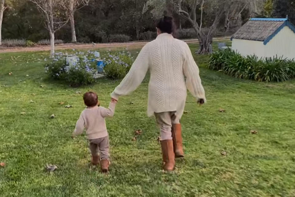 <p>Mom and Archie walk hand-in-hand — maybe to <a href="https://people.com/royals/meghan-markle-prince-harry-oprah-interview-chicken-coop-california-home-archie-chick-inn/" rel="nofollow noopener" target="_blank" data-ylk="slk:his chicken coop?;elm:context_link;itc:0;sec:content-canvas" class="link ">his chicken coop?</a></p>