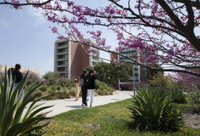 CLAREMONT, CA - APRIL 12: A campus tour takes place at Claremont McKenna College on Monday, April 12, 2021 in Claremont, CA. The school has reopened in-person tours after shutting them down last year amid the pandemic. The college tour is a key aid in helping students make their big decisions. (Myung J. Chun / Los Angeles Times)