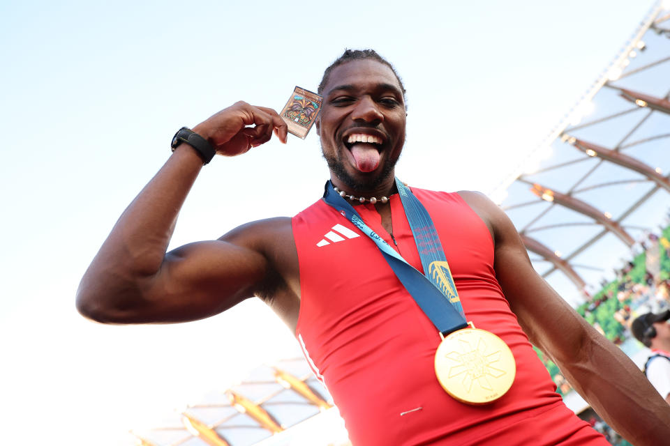 EUGENE, OREGON - JUNE 23: Noah Lyles poses with a Yu Gi Oh card and the gold medal after winning the men's 100 meter final on Day Three 2024 U.S. Olympic Team Trials Track & Field at Hayward Field on June 23, 2024 in Eugene, Oregon. (Photo by Christian Petersen/Getty Images)