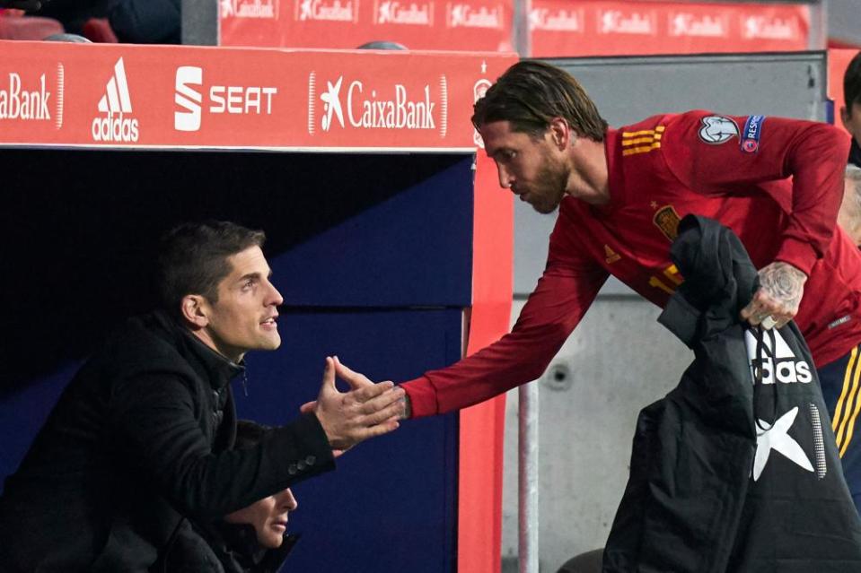 Robert Moreno shakes hands with Sergio Ramos during the Euro 2020 qualifier against Romania.