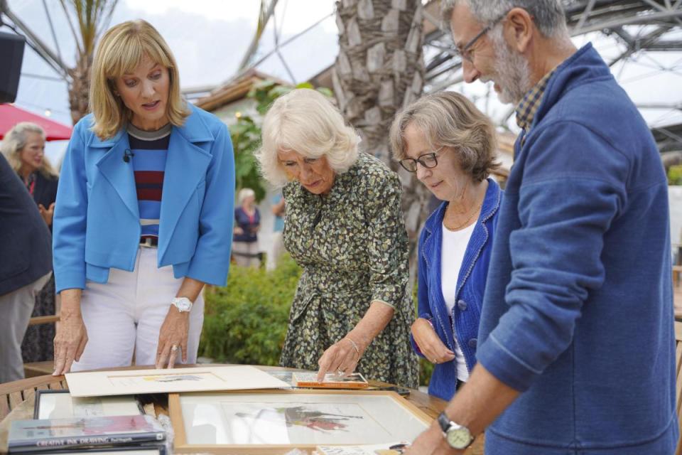 The Duchess of Cornwall (2nd-left) with BBC presenter Fiona Bruce (left) during a visit to the Antiques Roadshow at the Eden Project in Bodelva, Cornwall. <i>(Image: PA)</i>