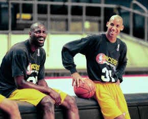 Indiana's Dale Davis (left) was always ready to back up Reggie Miller's antics on the court.