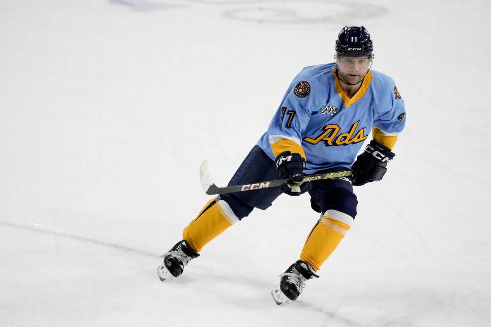 Milwaukee Admirals' Cody Hodgson skates during the team's American Hockey League game against the Rockford Icehogs on Friday, March 1, 2024, in Milwaukee. Hodgson is a former NHL player who retired from hockey eight years ago due to a muscle disorder but is now making a comeback. (AP Photo/Morry Gash)