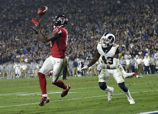 Atlanta Falcons wide receiver Julio Jones ices the game with a touchdown reception ahead of Los Angeles Rams strong safety John Johnson on Saturday night. (AP)