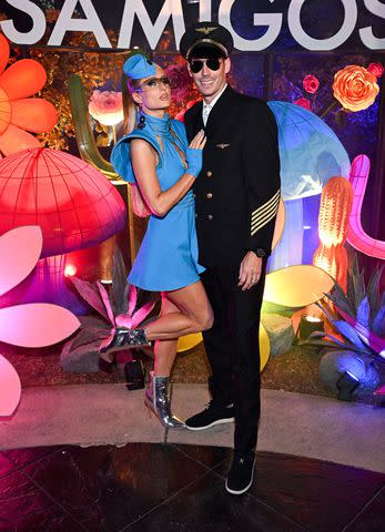 <p>Michael Kovac/Getty</p> Paris Hilton and Carter Reum attend the 2023 Casamigos Halloween Party
