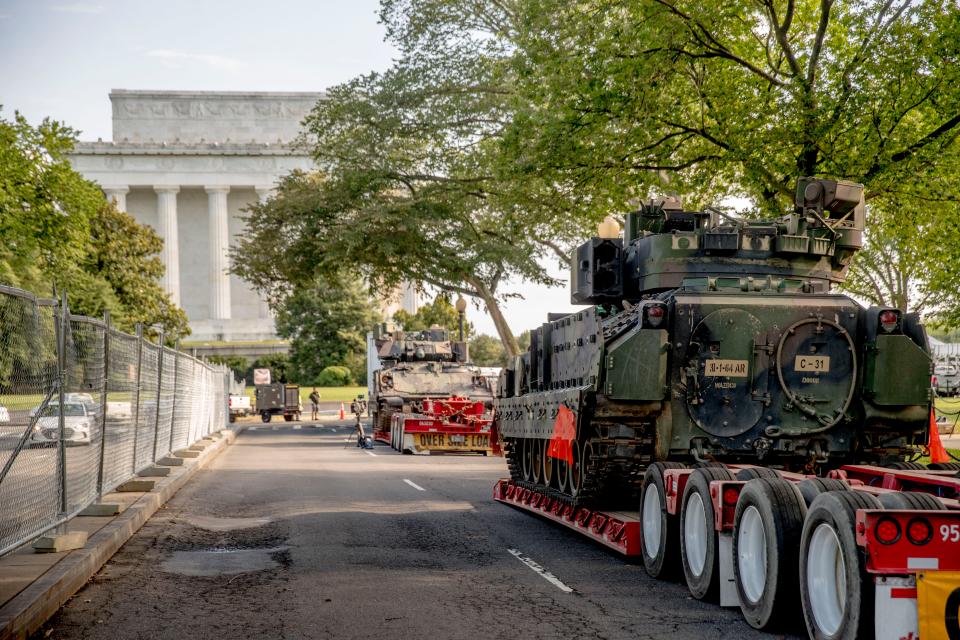 Two Bradley Fighting Vehicles are parked nearby the Lincoln Memorial for President Donald Trump's 'Salute to America' event honoring service branches on Independence Day.