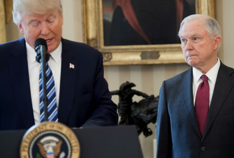 US President Donald Trump speaks alongside US Attorney General Jeff Sessions after Sessions was sworn in as Attorney General, at the Oval Office of the White House in Washington, DC, in February 2017