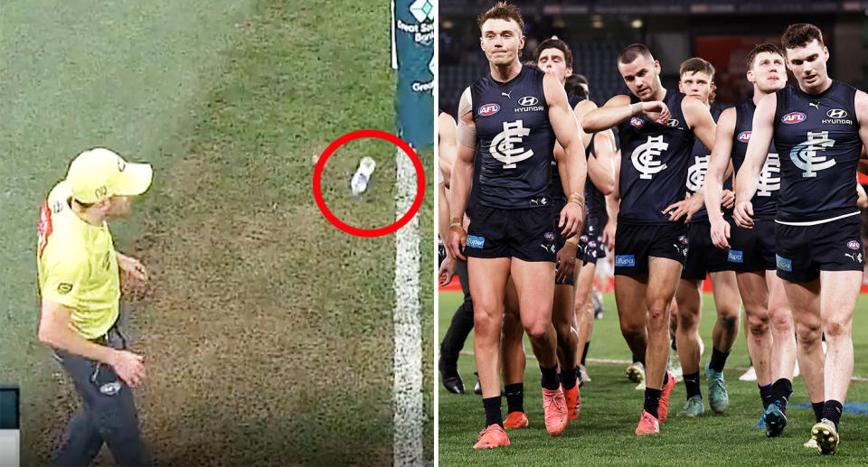 Carlton players alongside the goal umpire being struck by a water bottle.