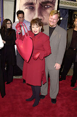 Roseanne doesn't seem pleased to be valentined out for her man at the Westwood premiere of 20th Century Fox's Cast Away