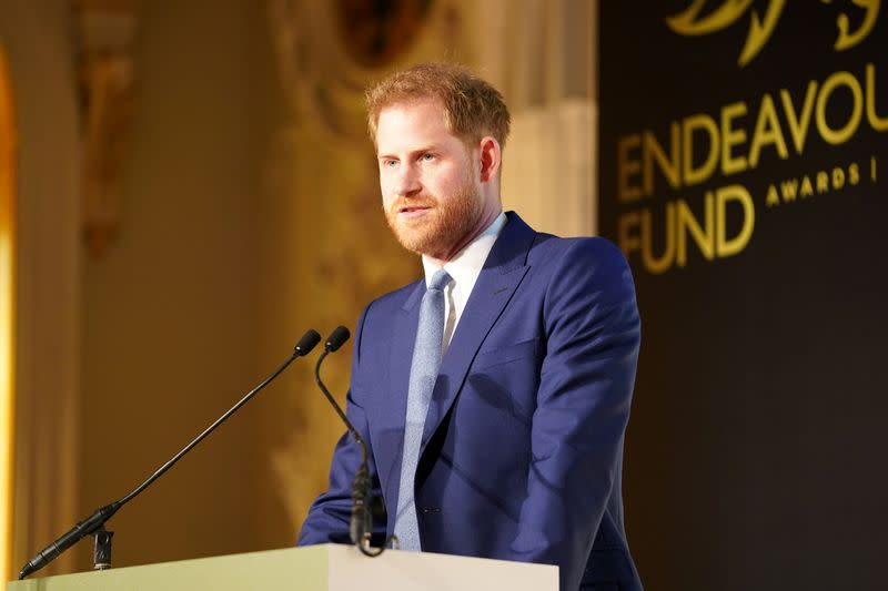 FILE PHOTO: Britain's Prince Harry and Meghan, Duchess of Sussex, attend Endeavour Fund Awards in London