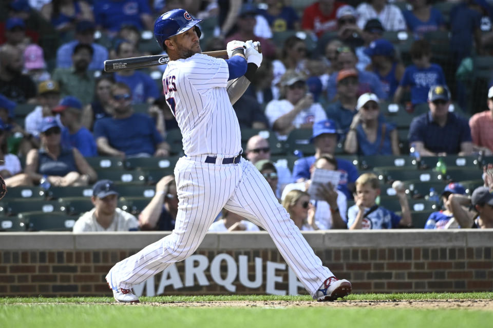 Chicago Cubs' Yan Gomes hits a two -RBI single against the Colorado Rockies during the third inning of a baseball game, in Chicago, Sunday, Sept. 18, 2022. (AP Photo/Matt Marton)