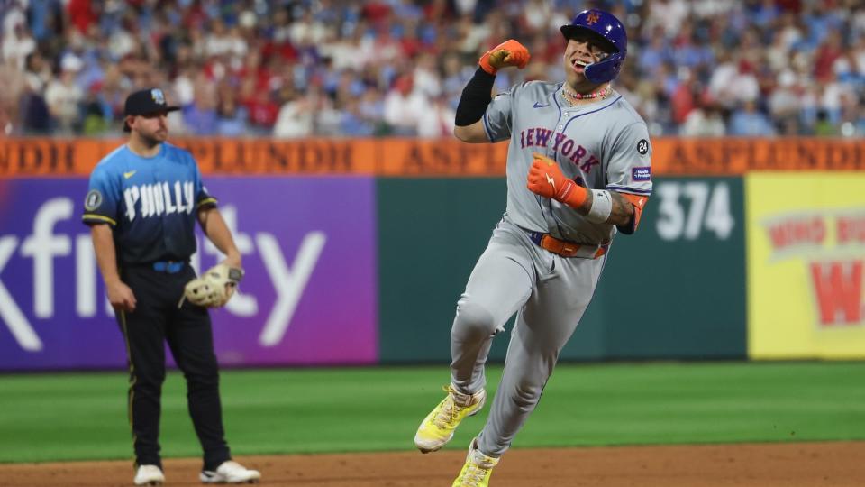 New York Mets catcher Francisco Alvarez (4) reacts as he runs the bases after hitting a three RBI home run during the fifth inning against the Philadelphia Phillies at Citizens Bank Park.