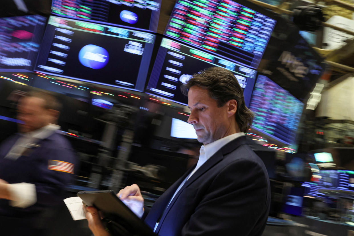 A trader works on the floor of the New York Stock Exchange (NYSE) in New York City, U.S., December 5, 2022.  REUTERS/Brendan McDermid