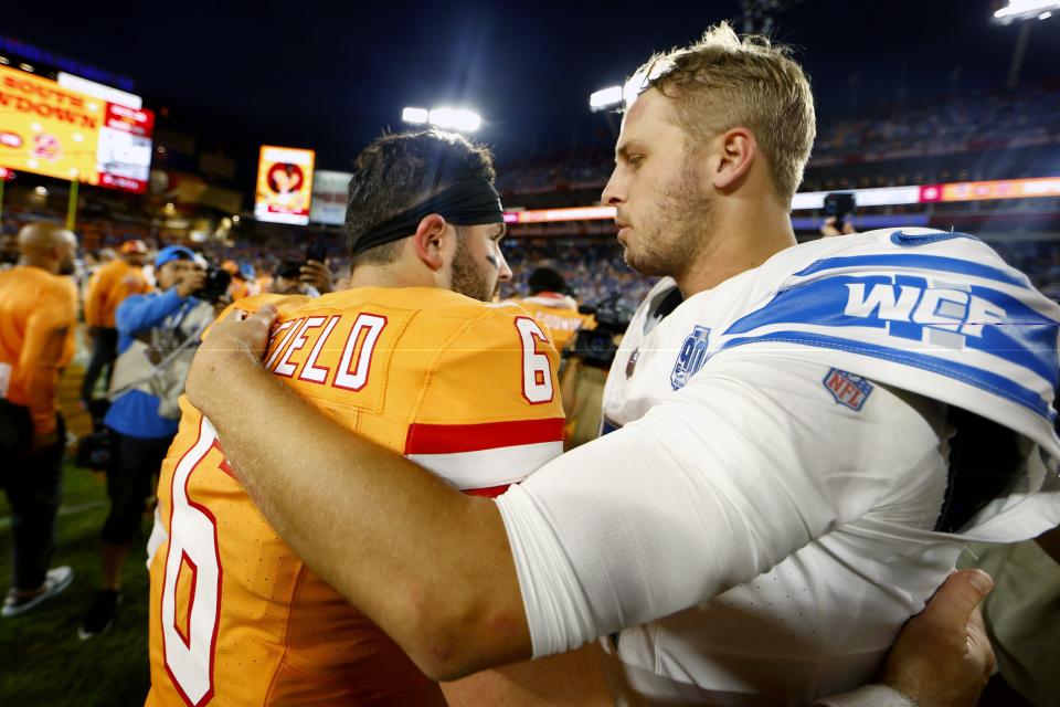 Baker Mayfield of the Tampa Bay Buccaneers and Jared Goff of the Detroit Lions hug after Detroit's 20-6 win at Raymond James Stadium on October 15, 2023, in Tampa, Florida.