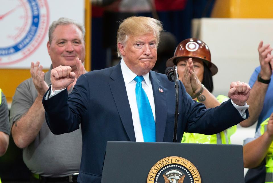 President Donald Trump reacts at the International Union of Operating Engineers International Training and Education Center, April 10, 2019, in Crosby, Texas.