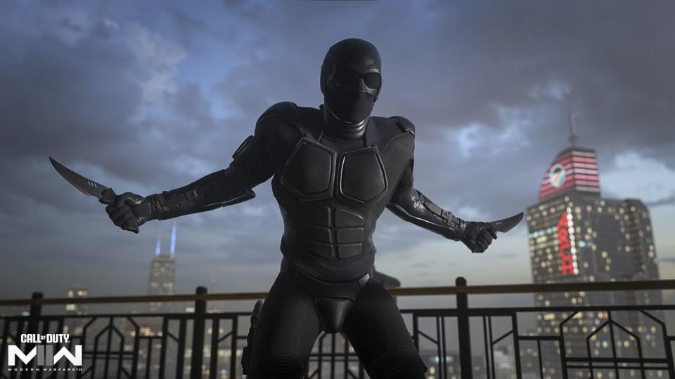 the boys character black noir stands against a city skyline at night holding knives in call of duty game