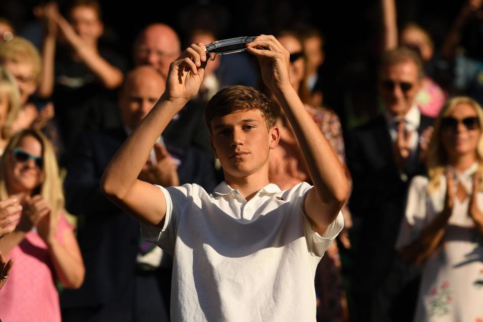 Britain's Jack Draper poses with his runners up plate after losing to Taiwan's Tseng Chun Hsin in their boys's singles final match: AFP/Getty Images