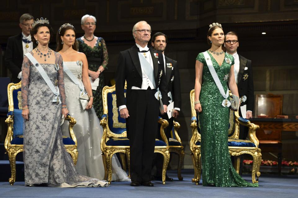 FILE - The Swedish Royal family, left to right, Queen Silvia, Princess Madeleine, King Carl XVI Gustaf, Prince Carl Philip, Crown Princess Victoria and Prince Daniel stand during the Nobel Prize award ceremony at the Stockholm Concert Hall in Stockholm, Sweden on Monday Dec. 10, 2012. The king and queen have three children, Princess Victoria, Prince Carl Philip and Princess Madeleine. (AP Photo/Scanpix Sweden/Jonas Ekstromer, Pool, File)