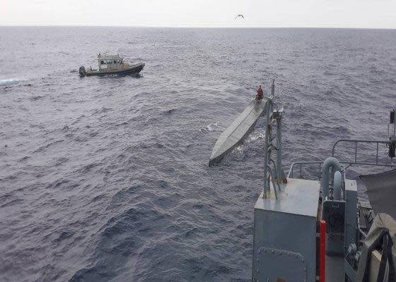 The Colombian navy seized a semi-submersible loaded with 1,750 tons of cocaine in the Pacific Ocean on Sunday, officials said.  / Credit: Colombia Navy