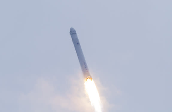 A SpaceX Falcon 9 rocket soars skyward after launching from Space Launch Complex 40 on Cape Canaveral Air Force Station in Florida at 10:10 a.m. EST on March 1, 2013, carrying a Dragon capsule filled with cargo toward the International Space St