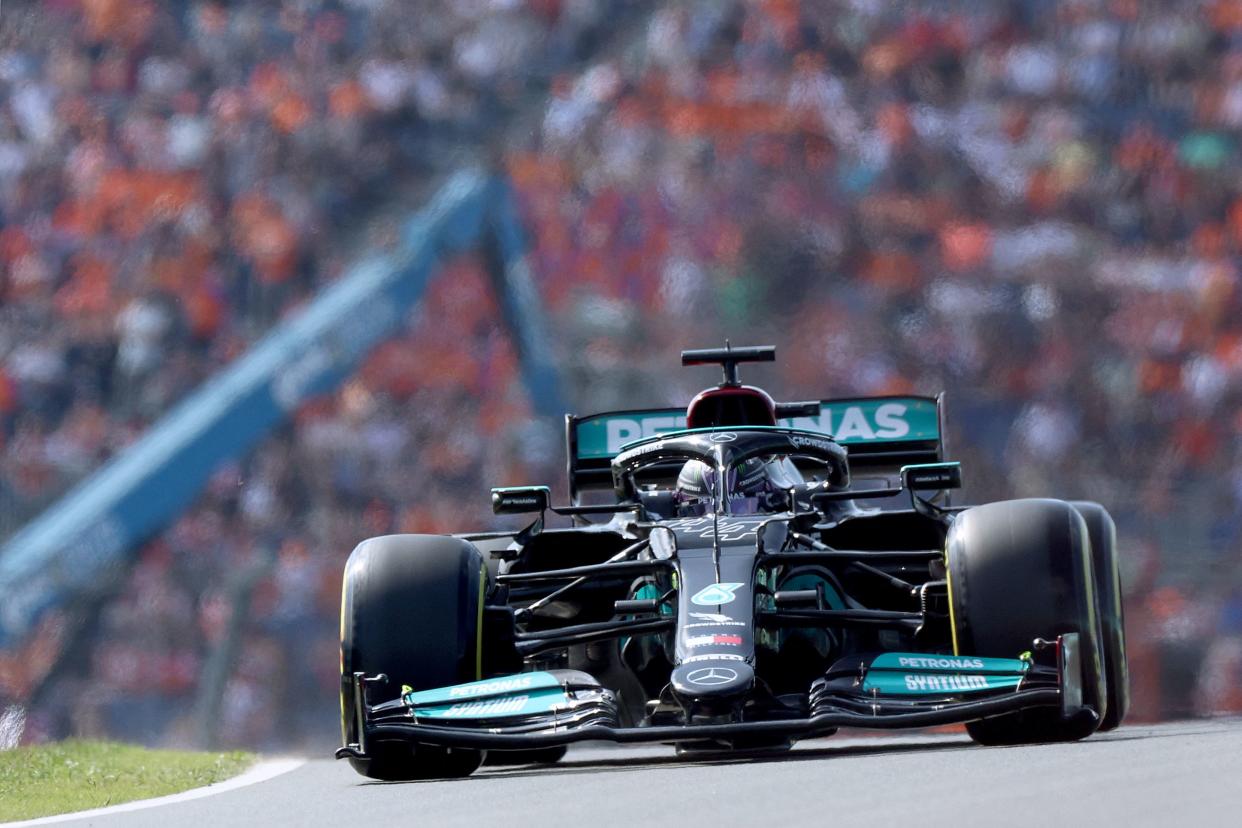 Mercedes' British driver Lewis Hamilton steers his car at the Zandvoort circuit during the second free practice session.