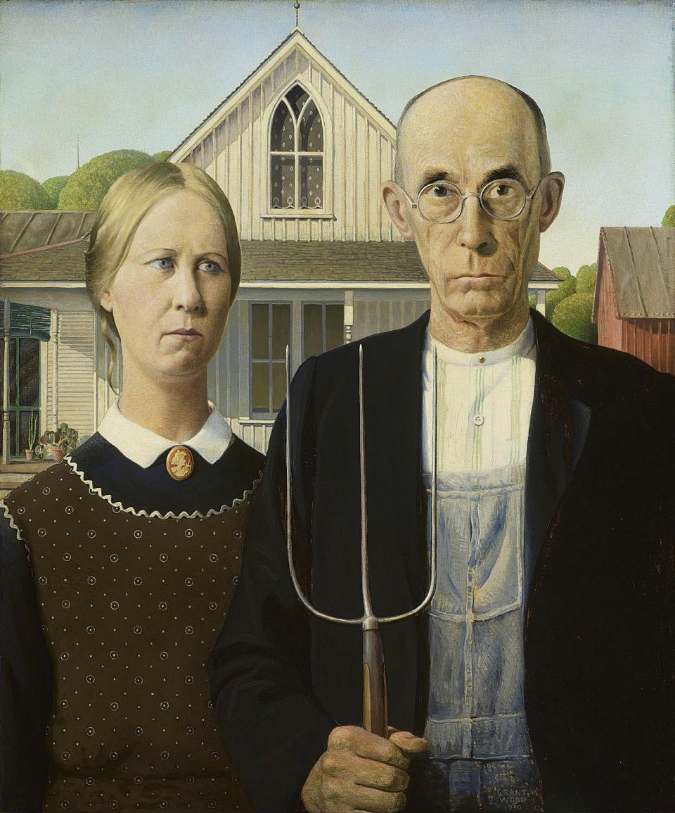 This image provided by The Art Institute of Chicago via Art Everywhere, shows Grant Wood's 1930 "American Gothic." Five museums say they are organizing the largest outdoor art show to showcase American art nationwide this summer. Beginning Monday, April 7, 2014, curators are asking the public to vote online to choose which artwork will be featured on 50,000 displays for the “Art Everywhere” initiative in August. Members of the Outdoor Advertising Association of America are donating the space. (AP Photo/Art Institute of Chicago, Friends of American Art Collection)