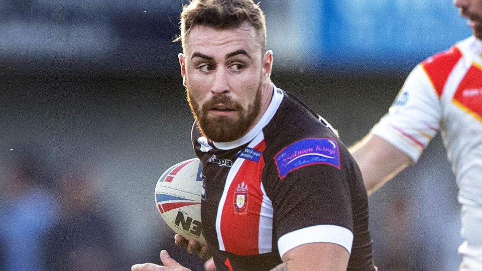 Jansin Turgut in action for Salford Red Devils. (Photo by Tim Clayton/Corbis via Getty Images)