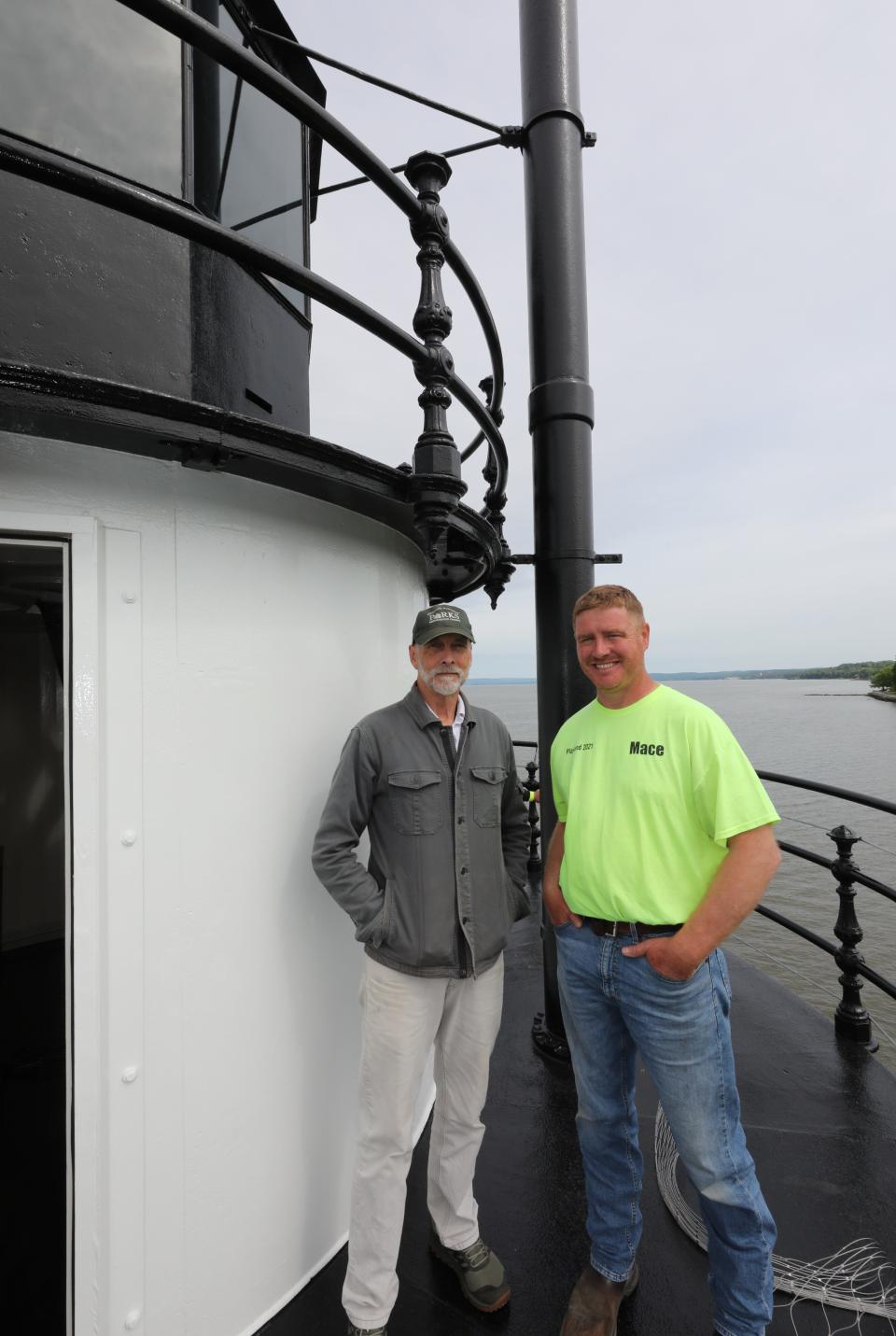 John Phillips, the curator, and Tom Soricelli, the foreman from Mace, are pictured on the gallery of the restored Tarrytown Lighthouse in Sleepy Hollow, May 17, 2024.