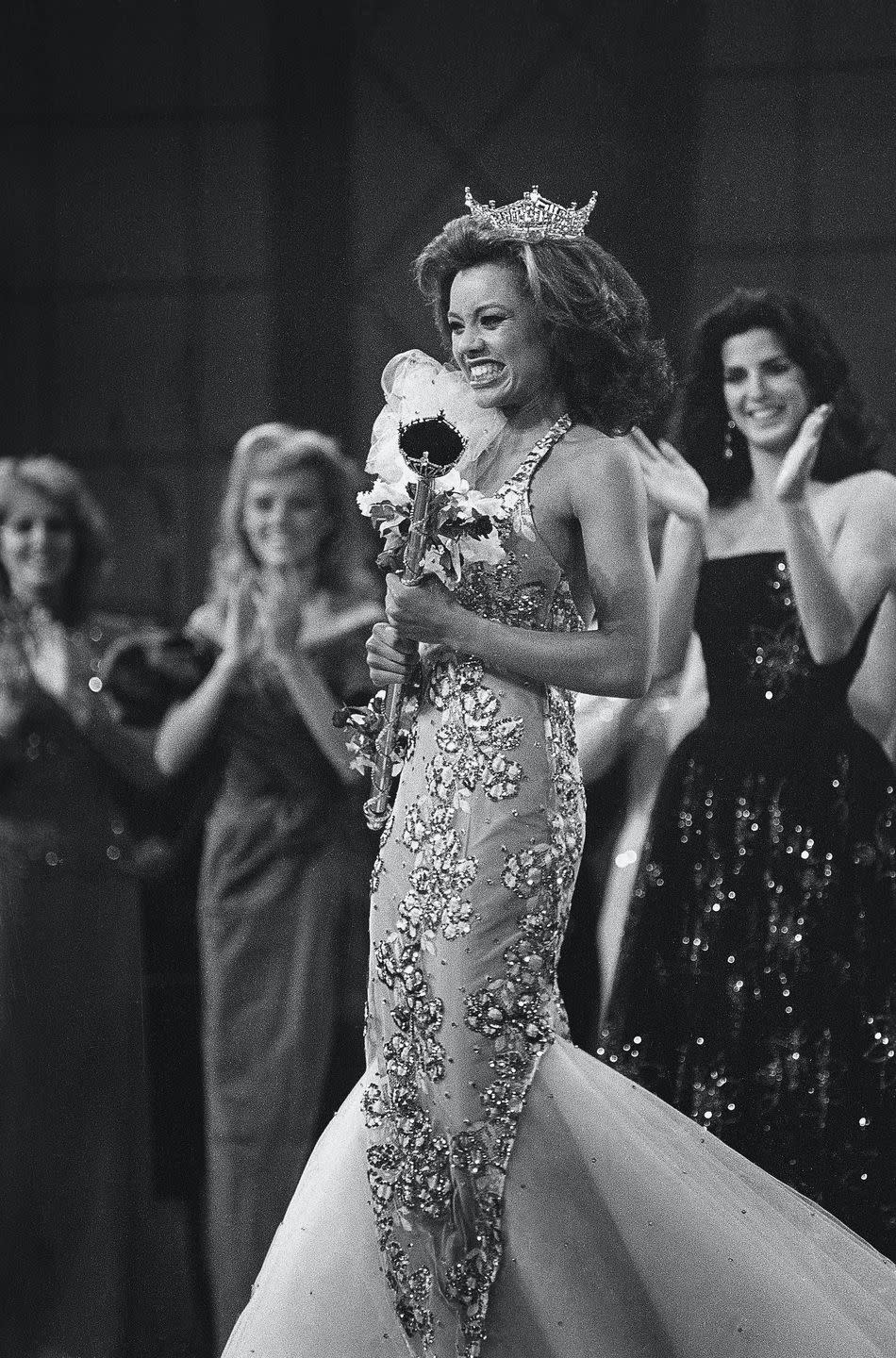 <p>A young Vanessa Williams not only looked flawless in this mermaid-style evening gown when she represented New York in 1984, but she also made history as the first African American woman to win the title. </p>
