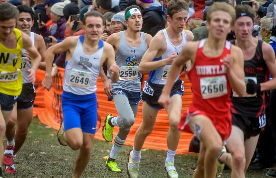 Rockford Guilford's Juan Del Real (2550) maneuvers through a crowd to a 58th-place finish in the Class 3A boys state cross-country meet Saturday, Nov. 5, 2022 at Detweiller Park in Peoria.