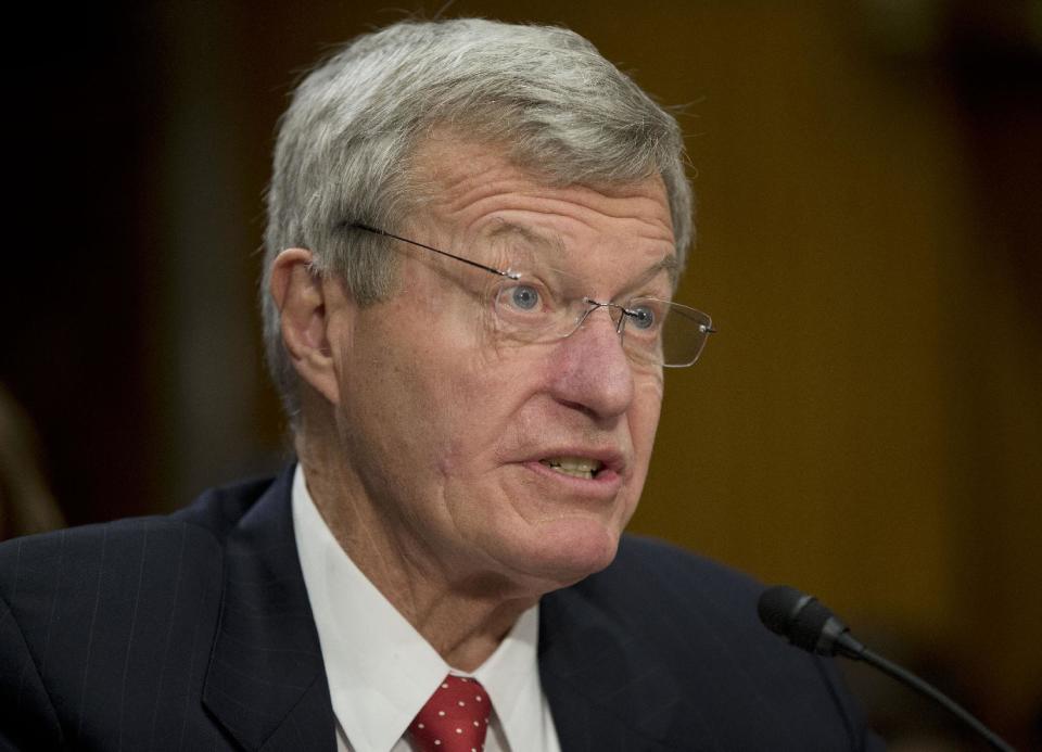 FILE - This Jan. 28, 2014 file photo shows retiring Montana Sen. Max Baucus testifying on Capitol Hill in Washington before the Senate Foreign Relations Committee hearing on his nomination to become US ambassador to China. The Senate was preparing Thursday to confirm veteran Baucus as ambassador to China, handing the job to a lawmaker who is familiar with U.S. trade policy but has little expertise about military and other issues that have caused tensions in recent years with Beijing. (AP Photo/Pablo Martinez Monsivais, File)