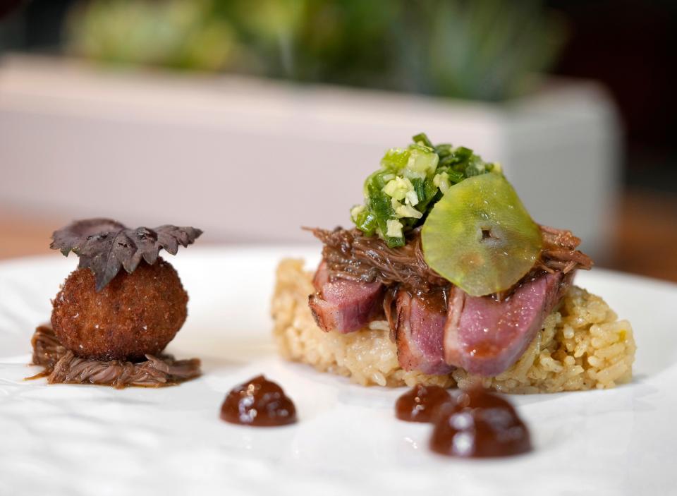 The dry-aged Rohan duck from Agni's six-course tasting menu includes cured and grilled duck breast, a curry croquette, chutney, jhol and duck fat achari polao.