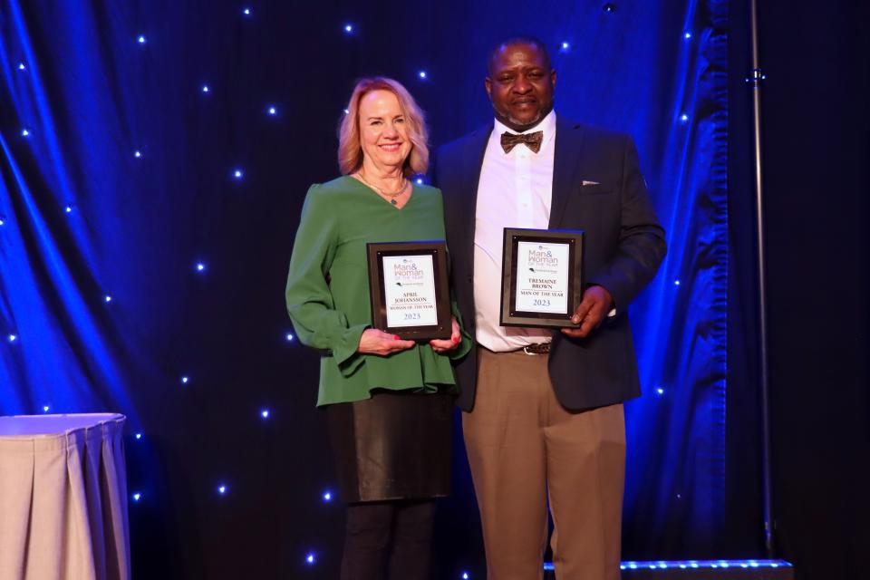 April Johansson, Amarillo Globe-News 2023 Woman of the Year and Tremaine Brown, Amarillo Globe-News 2023 Man of the Year, stand with their awards at a ceremony held at the Amarillo Civic Center on Thursday night.