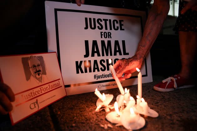 The Committee to Protect Journalists and other press freedom activists hold a candlelight vigil in front of the Saudi Embassy where Khashoggi died during a memorial event in 2019. (Photo: Sarah Silbiger via Reuters)