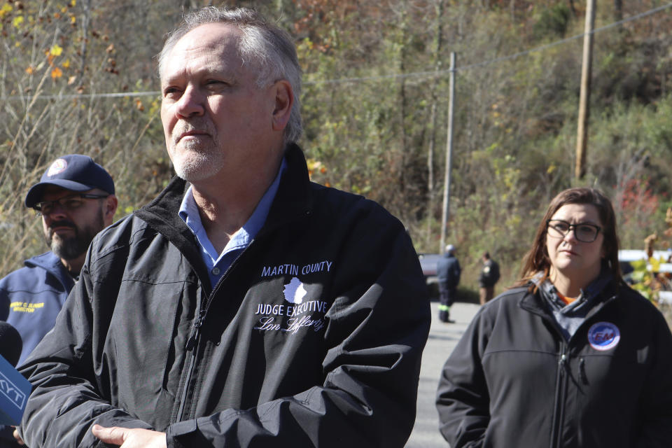 Martin County Judge Executive Lon Lafferty addresses reporters outside a road leading to the abandoned Martin Mine Prep Plant in Inez, K.Y. where the collapse of an 11-story tipple killed at least one man on Wednesday, Nov. 1, 2023. (AP Photo/Leah Willingham)