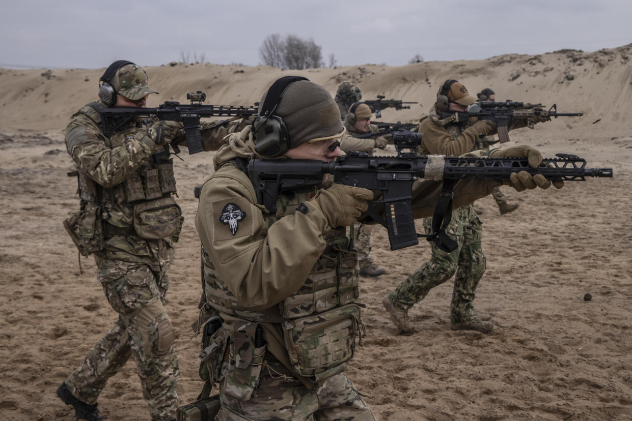 Ukrainian men, who might be called up to serve in the military, training at a camp near Kyiv, Ukraine, on March 16, 2024. (David Guttenfelder/The New York Times)