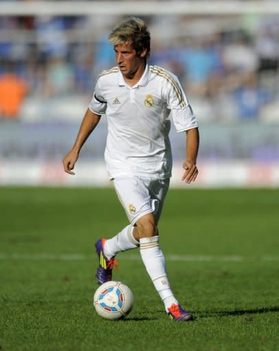Real Madrid's Portuguese defender Fabio Coentrao plays the ball during the friendly football match Hertha Berlin vs Real Madrid at the Olympic stadium in Berlin, July 2011. The Madrid club notably recruited Coentrao from Benefica for 30 million euros
