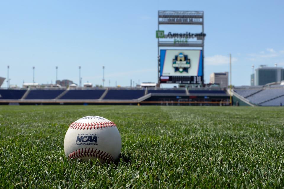 A baseball sits on the outfield grass at Charles Schwab Field Omaha in Omaha, Nebraska in 2018.