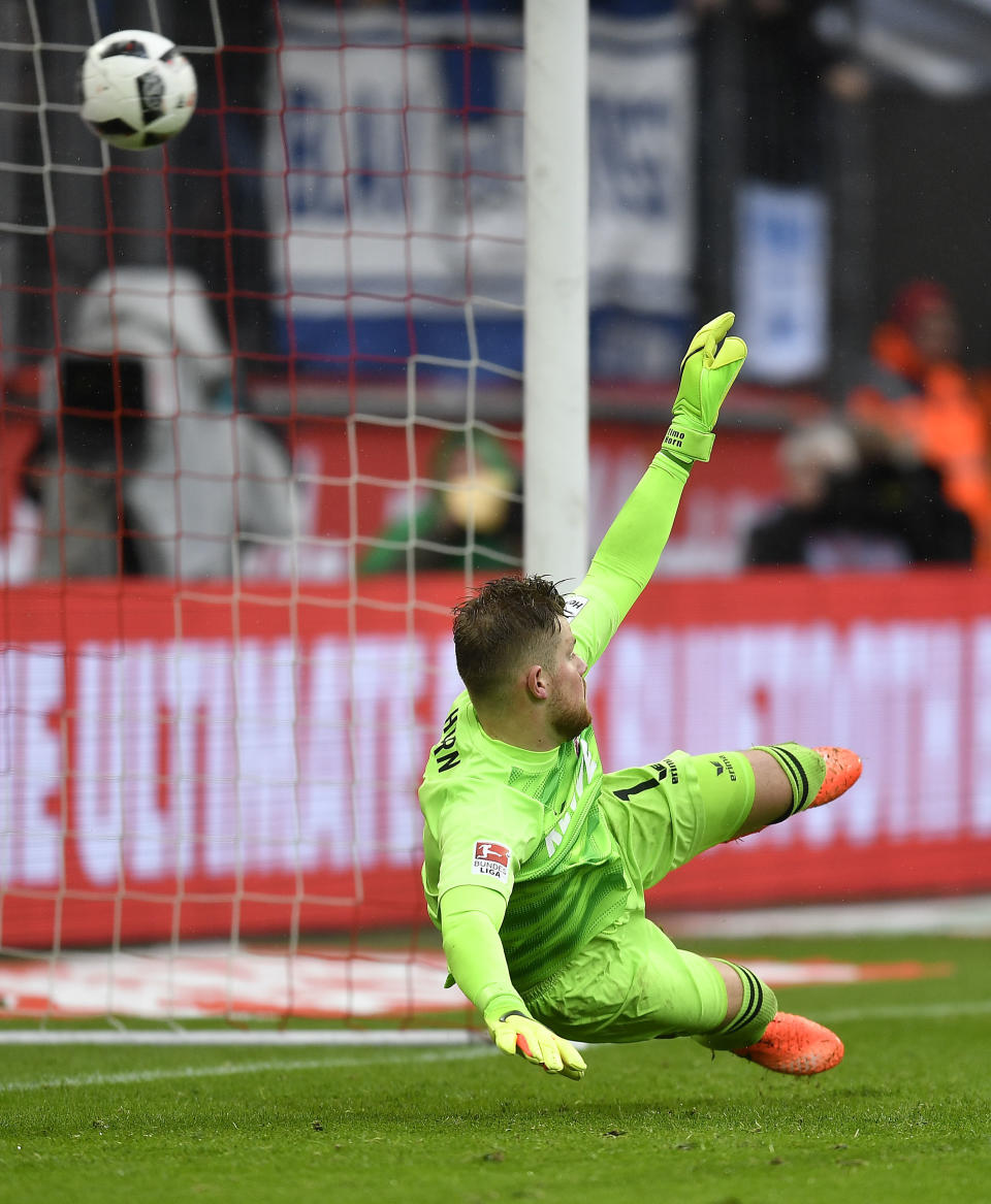 Cologne goalkeeper Timo Horn receives a penalty goal during the German Bundesliga soccer match between 1.FC Cologne and Hertha BSC Berlin in Cologne, Germany, Saturday, March 18, 2017. (AP Photo/Martin Meissner)