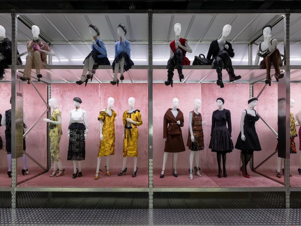 a group of mannequins wearing clothing