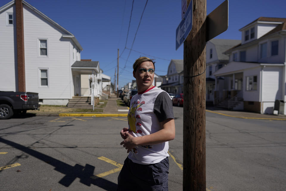 Trixy Valentine, aka Jacob Kelley, walks in street clothes and makeup after performing at the "Spring Fever Drag Brunch," Sunday, March 26, 2023, at the Kulpmont Winery in Kulpmont, Pa. (AP Photo/Carolyn Kaster)