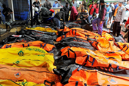 Bodies of tsunami victims are collected at a local health facility after a tsunami hit Carita in Pandeglang, Banten province, Indonesia, December 23, 2018 in this photo taken by Antara Foto. Antara Foto/Asep Fathulrahman/ via REUTERS