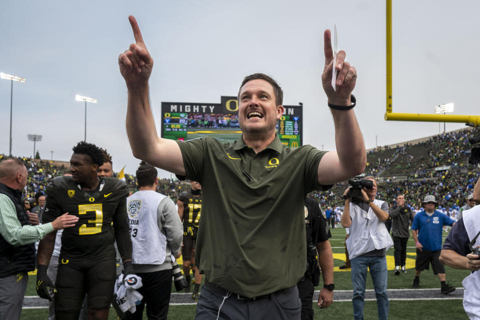 Oregon head coach Dan Lanning leaves the field after an NCAA college football game against BYU, Saturday, Sept. 17, 2022, in Eugene, Ore. (AP Photo/Andy Nelson)