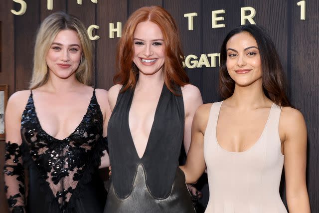 <p>Mark Von Holden/Variety via Getty</p> Lili Reinhart, Madelaine Petsch, and Camila Mendes at the premiere of 'The Strangers: Chapter One'