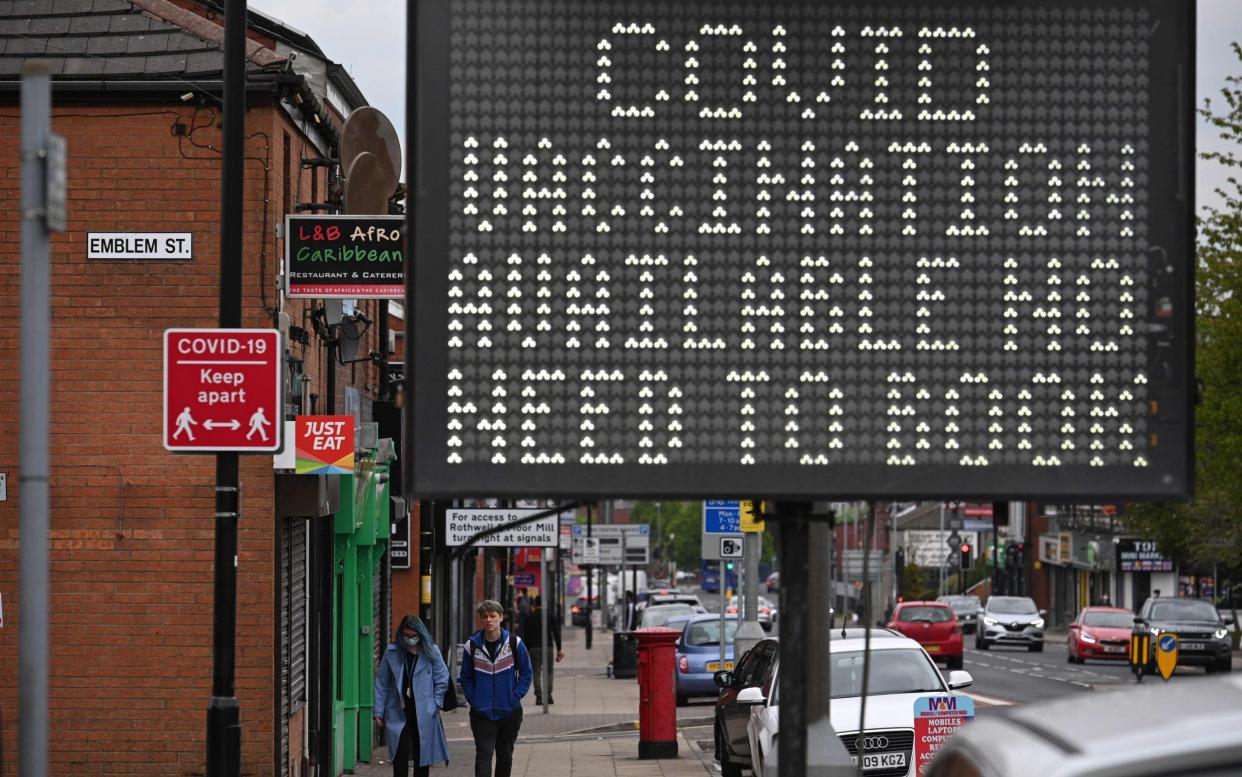 A sign in Bolton, Lancashire, which has seen a rise in Indian variant cases, offers people a Covid jab without the need to make an appointment - Oli Scarff/AFP via Getty Images