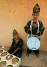 Sanjay village: Two Minang kids playing traditional Minangkabau's music in Sanjay Villay, Bukittinggi. (